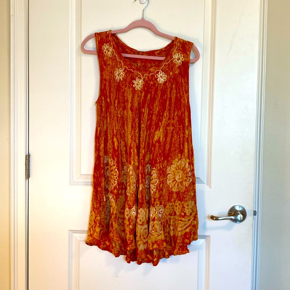 Swingy summer beach coverup‎ in orange with white flower detailing